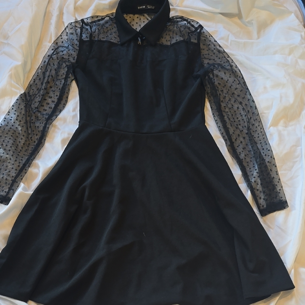 Elegant Black Dress with Sheer Polka Dot Sleeves